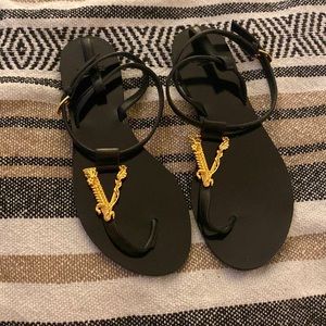 I am selling Versace sandals. Black and gold